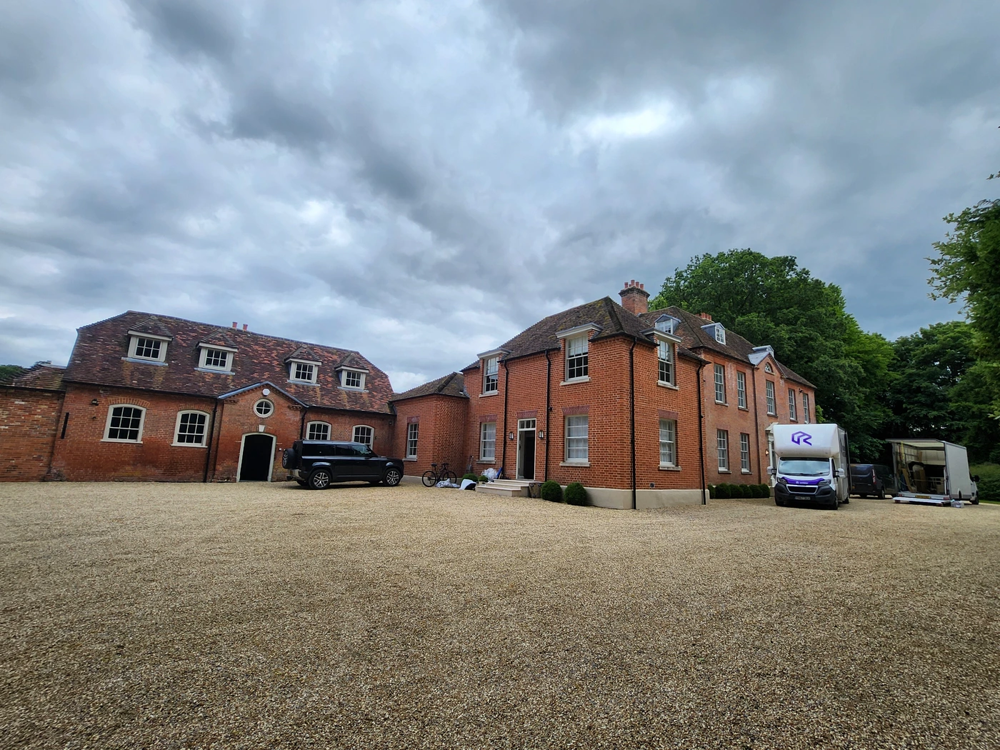 Rad Removals team unloading a delivery at a countryside manor in Finchampstead from long-term storage